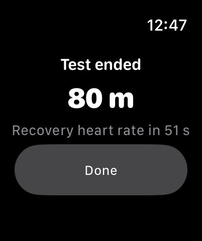 Apple Watch showing Test ended, 80 m, and the recovery heart rate countdown